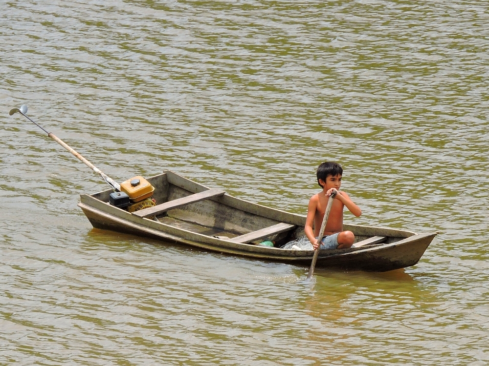 Boy in boat Boy in boat