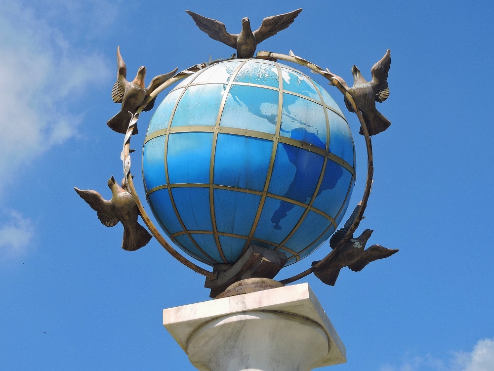 A globe sculpture with Doves of Peace A globe sculpture with Doves of Peace